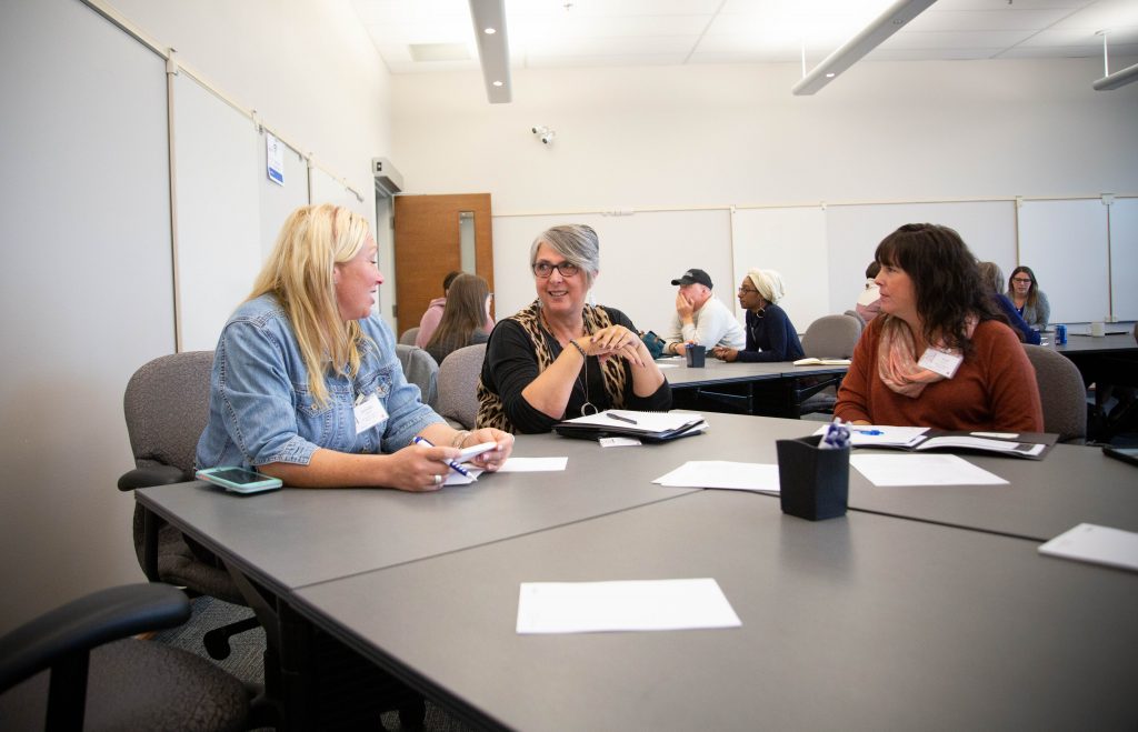 Groups sitting at desks